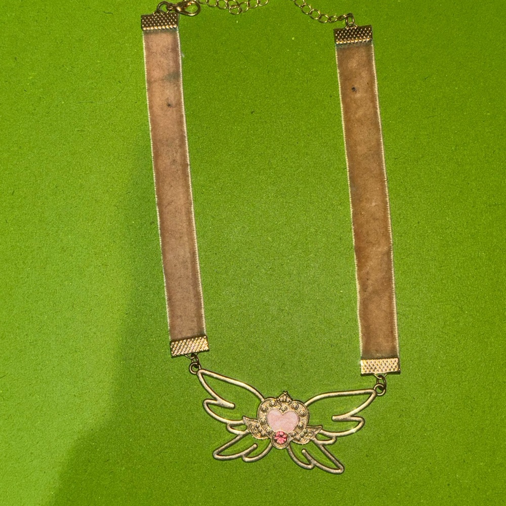 Chic Gold Winged Heart Necklace with Pink Accents